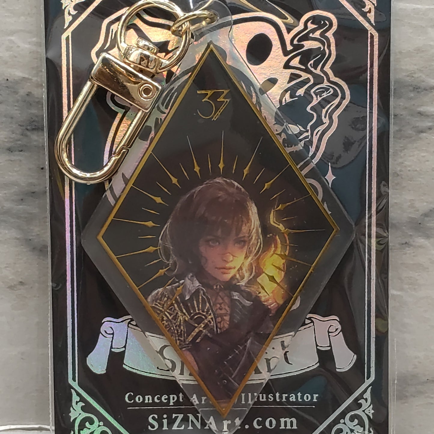 Sciel Gold Foiled Leychain