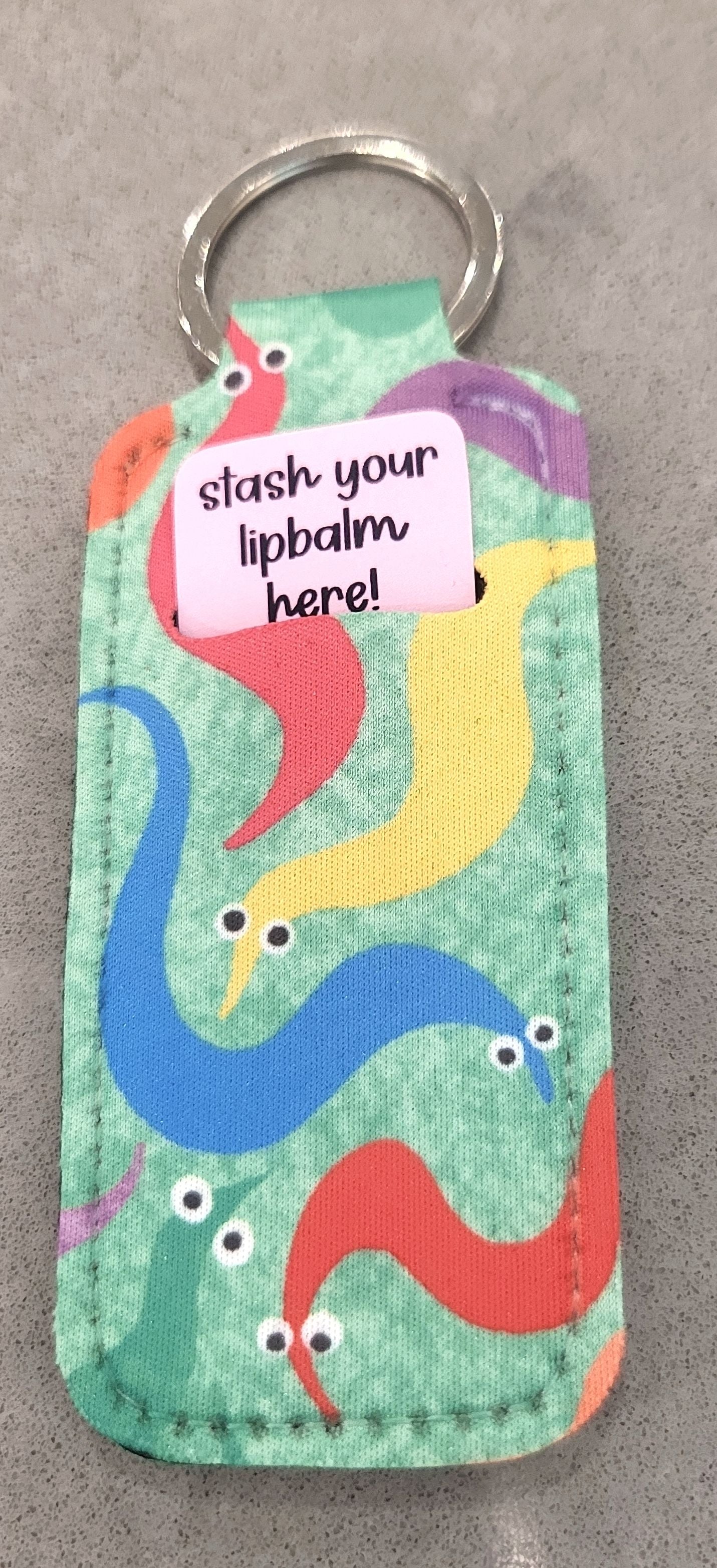 worm on a string lip balm holder