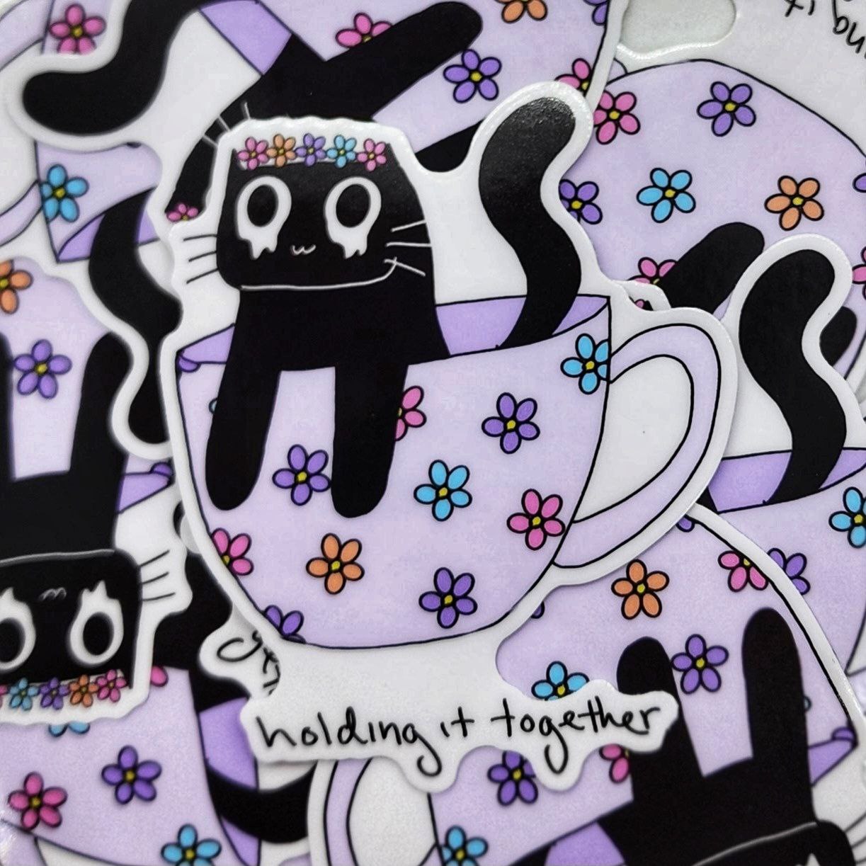 Holding It Together Sticker