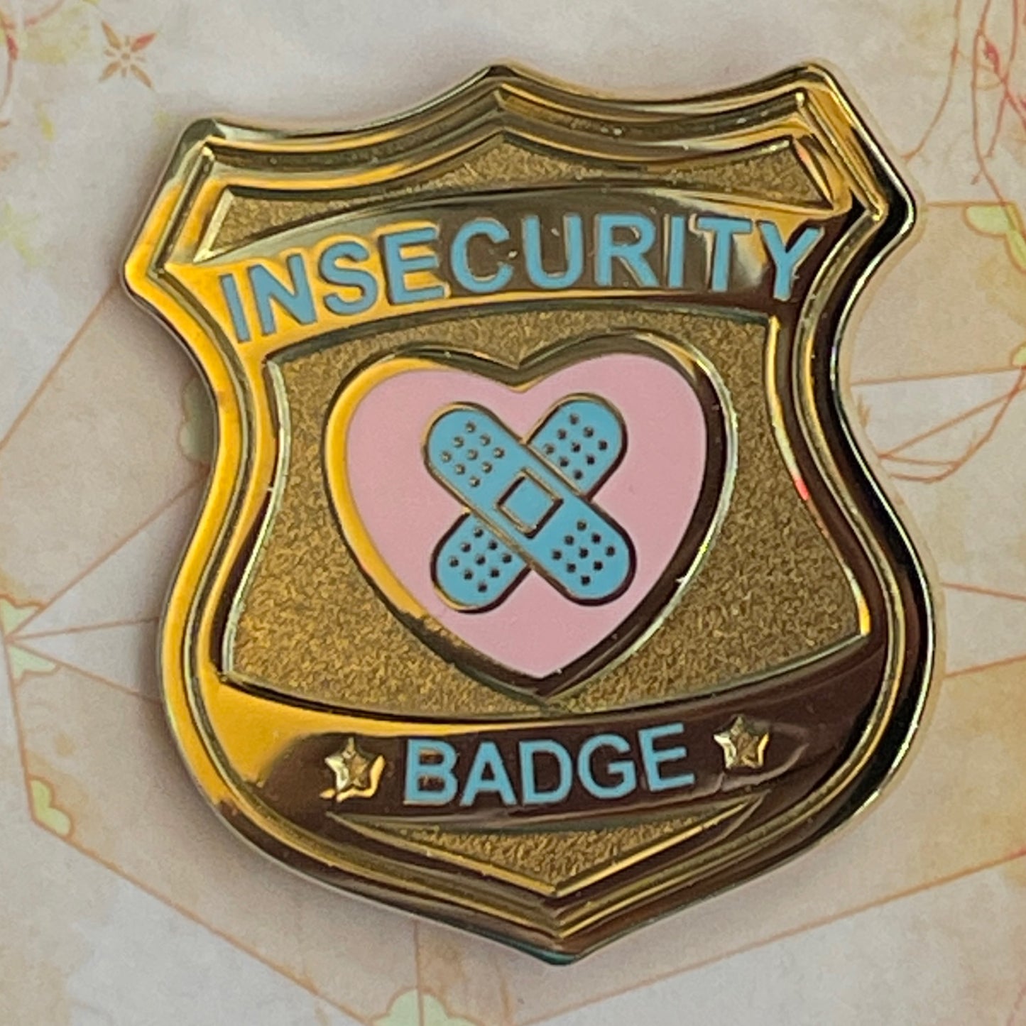 Insecurity badge gold