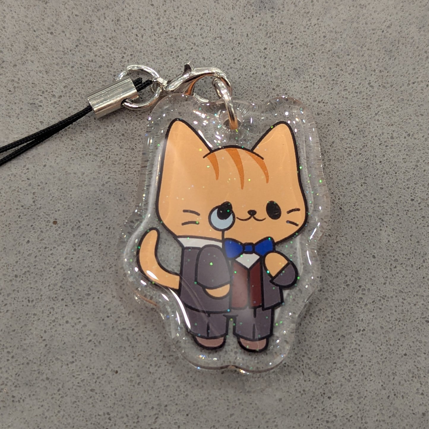 Orange Monocle Cat Charm