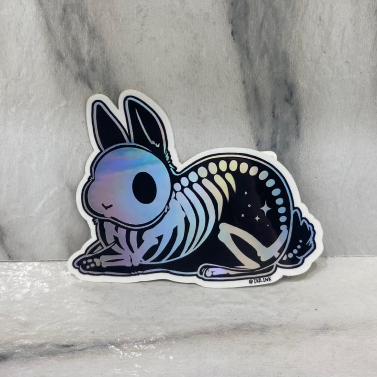 Skelebun Sitting Holo Sticker